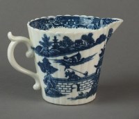 Lot 182 - A fluted Caughley milk jug transfer-printed...