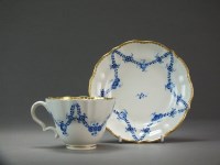 Lot 211 - A Caughley coffee cup and saucer painted with...