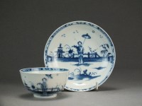 Lot 221 - A Caughley tea bowl and saucer painted with...