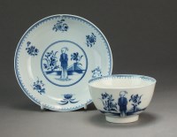 Lot 223 - A Caughley tea bowl and saucer painted with...