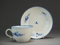 Lot 228 - A Caughley tea cup and saucer painted with the...