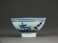 Lot 238 - A Caughley tea bowl painted with the Blown...