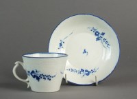 Lot 249 - A Caughley coffee cup and saucer with basket...