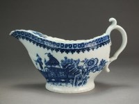 Lot 264 - A half-fluted Caughley sauce boat...