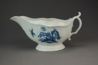 Lot 267 - A Caughley sauce boat transfer-printed with...