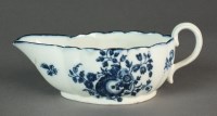 Lot 276 - A Caughley sauce boat transfer-printed in the...