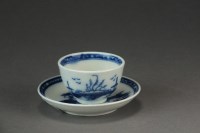 Lot 335 - A Caughley toy tea bowl and saucer painted in...