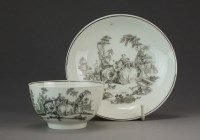 Lot 360 - A Worcester tea bowl and saucer printed in...