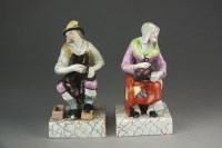 Lot 380 - A pair of Staffordshire pearlware figure of...