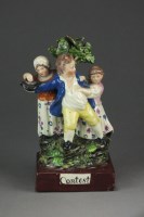 Lot 385 - A Staffordshire figural group of 'Contest',...