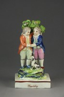 Lot 386 - A Staffordshire pearlware figural group of...