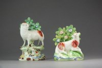 Lot 389 - Two Staffordshire bocage models of sheep,...