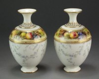 Lot 452 - A pair of Royal Worcester vases painted with a...