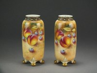 Lot 454 - A pair of Royal Worcester fruit-painted vases...