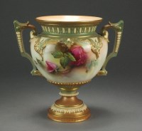 Lot 470 - A Royal Worcester twin handled vase painted...