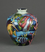 Lot 484 - A Moorcroft Martinique pattern vase designed...