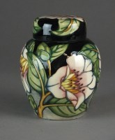 Lot 490 - A Moorcroft Cavendish pattern ginger jar and...