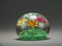 Lot 509 - A Ysart Scottish glass paperweight decorated...