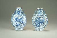 Lot 534 - A pair of Chinese blue and white moon flasks,...