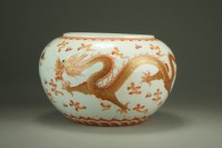 Lot 551 - A Chinese iron red dragon vase, Daoguang seal...