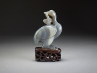 Lot 575 - A Chinese carved agate figure of a crane bird,...