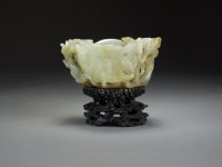 Lot 582 - A Chinese grey-green jade libation cup, Qing...