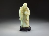 Lot 583 - A Chinese jade figure of Shou Lao, late...