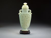 Lot 584 - A Chinese celadon jade vase and cover, late...