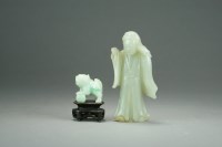 Lot 589 - A Chinese celadon jade figure of Guanyin, late...