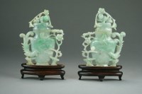 Lot 590 - A pair of Chinese jadeite vases and covers,...