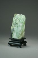 Lot 593 - A mottled green jadeite boulder carving, late...