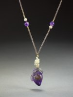 Lot 595 - A Chinese amethyst pendant, Qing Dynasty,...