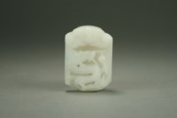 Lot 597 - A Chinese near white jade buckle, Qing Dynasty,...