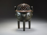 Lot 600 - A Chinese bronze tripod censer with silver...