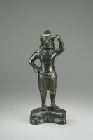 Lot 606 - A Sino-Tibetan bronze figure of a protector...