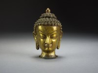 Lot 608 - A Sino-Tinetan bronze head of Buddha, Qing...