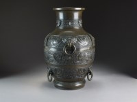 Lot 615 - A Chinese bronze vase, Qing Dynasty, of ovoid...