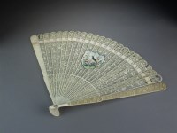 Lot 635 - A Chinese ivory brise fan, 19th Century, the...