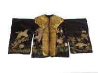 Lot 641 - A Chinese or East Asian silk ceremonial robe,...