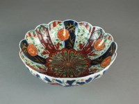 Lot 653 - A Japanese Imari bowl, Meiji period, of fluted...