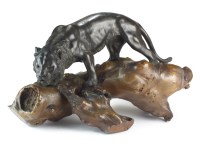 Lot 665 - A Japanese bronze figure of a tiger by...