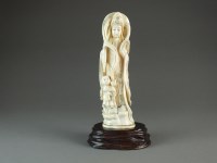 Lot 671 - A Japanese marine ivory figure group of...