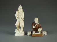 Lot 676 - A Japanese ivory okimono of a huntsman, Meiji...