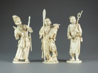 Lot 681 - Three Japanese sectional ivory figures, Meiji...