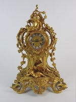 Lot 830 - A Louis XV style ormolu mantel clock with 3.5...