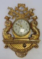 Lot 841 - A large giltwood cartel type wall clock, the...