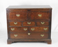 Lot 847 - A George III and later oak mule chest the...