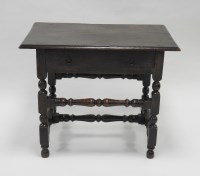 Lot 867 - An early 18th century style oak single drawer...