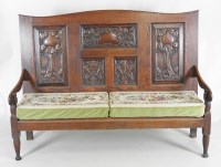 Lot 893 - A 19th century oak settle the five panel back...