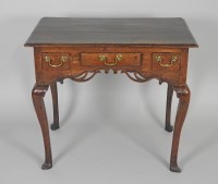 Lot 903 - An 18th century style oak lowboy, the three...